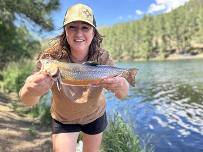 Cassandra Sanchez caught a 16-inch brook trout using a worm on June 14. 2026 at Bonito Lake.