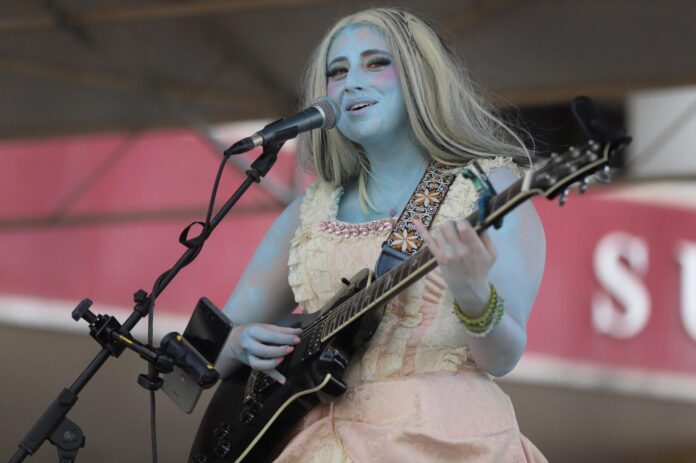 Janie Violet, a self-proclaimed “singer, alien and cowgirl,” performs a new song on the Main Stage on June 2 during Roswell’s UFO Festival.