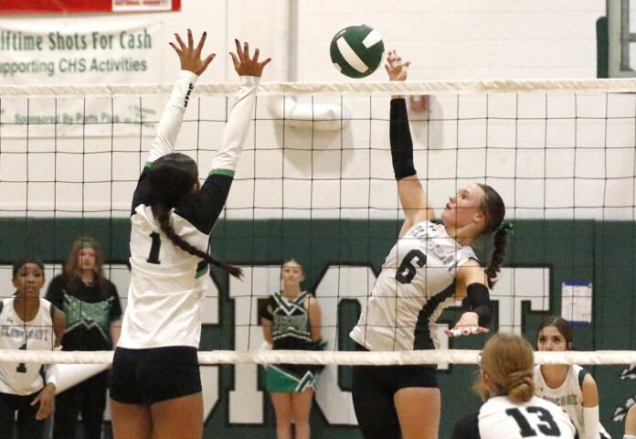 Cloudcroft hitter Delanie Dallas (6) sends the ball over the net against the block attempt of Hagerman’s Lupe Mendoza on Sept. 10 at Cloudcroft.
