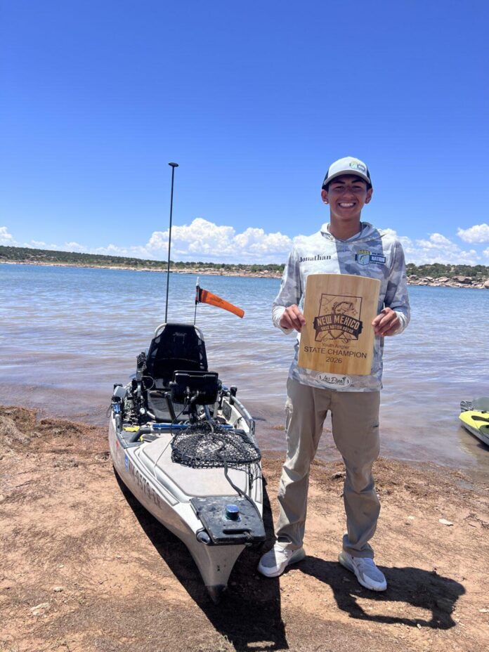 Jonathan Chavez and his first-place trophy at the 2026 NMBNK Youth Championship.