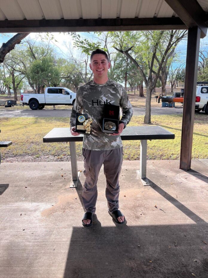 Noah Hoffman shows off his trophies at the New Mexico Bass Nation Kayak Anglers Classic Championship on Sept. 27, 2026 at Conchas Lake.