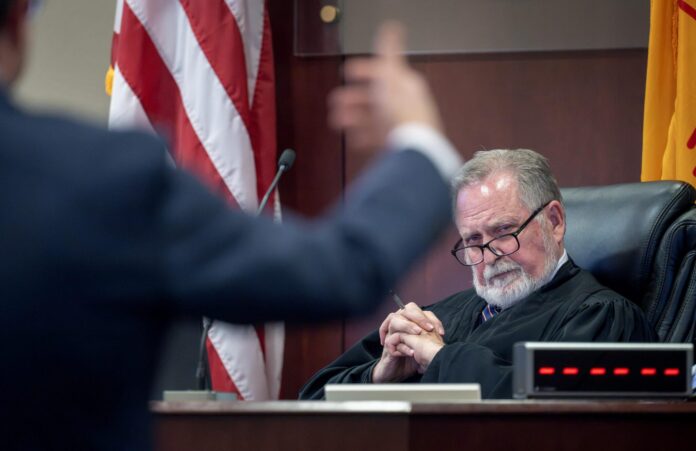 First District Judge Francis Mathew listens to attorney Matthew Nicholson, representing Meta Platforms Inc. during a hearing to determine the penalties against Meta on Oct. 1, 2026.